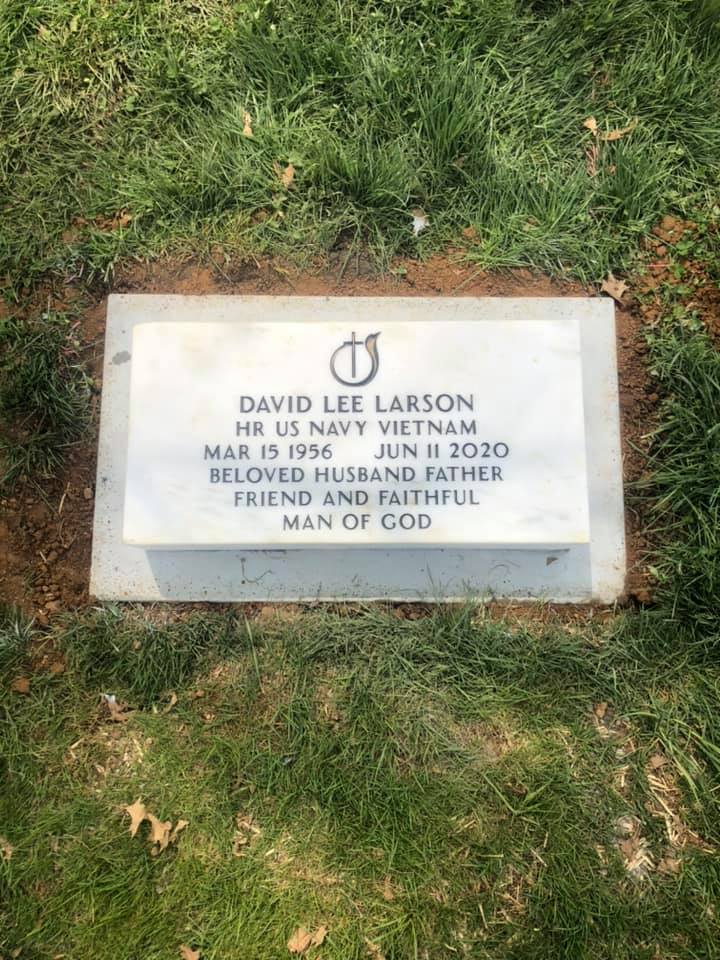 Flat grave marker for a U.S. Navy Vietnam veteran at the cemetery