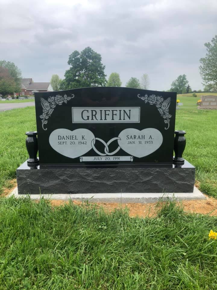 Elegant companion burial monument in polished black granite at Bells Corners Cemetery